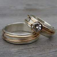 Tweekleurige ringenset met heldere zirkonia