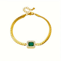 Gouden armband met groene vierkante edelsteen
