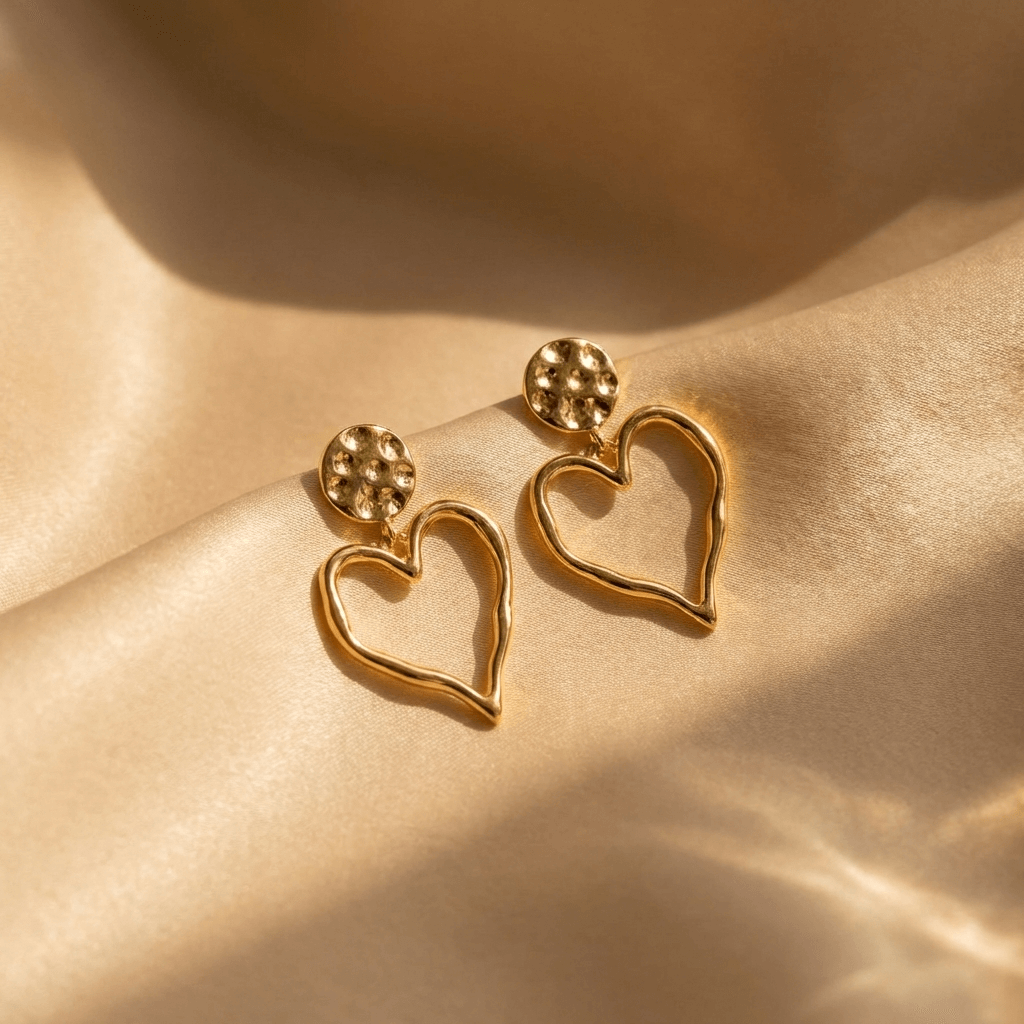 Gouden oorbellen met open hart