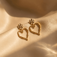 Gouden oorbellen met open hart