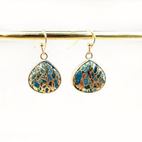 Gouden bohemian druppeloorbellen met turquoise mozaïek
