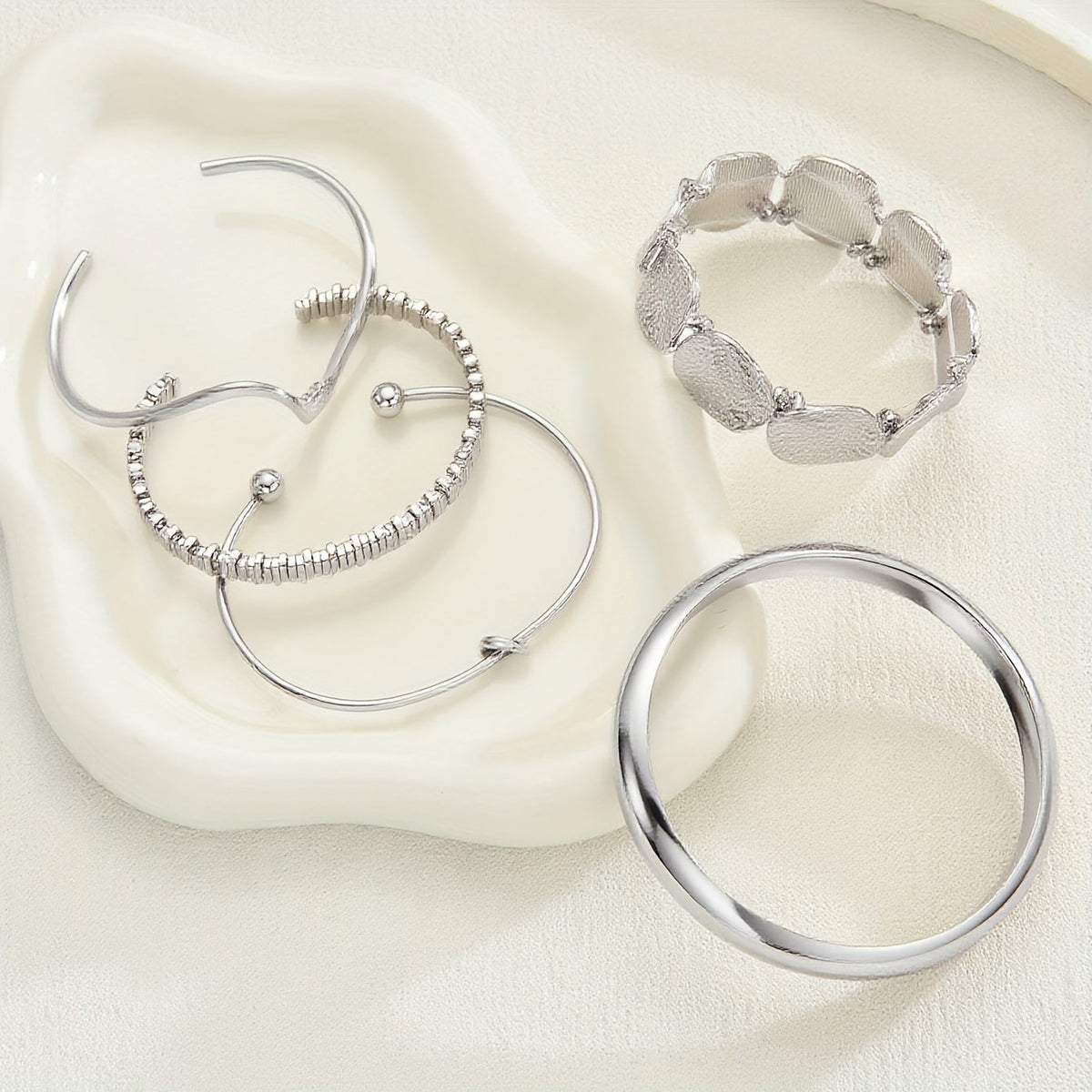 Zilveren gestapelde cuff-armbandenset