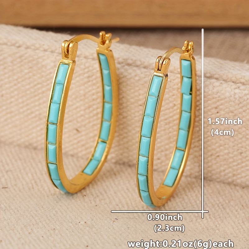 Gouden ovale oorbellen met turquoise