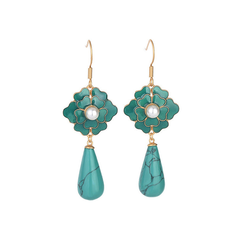 Vintage oorbellen met turquoise bloem en druppelhanger