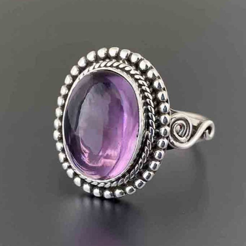 Zilveren vintage ring met ovale roze edelsteen