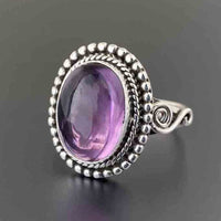 Zilveren vintage ring met ovale roze edelsteen