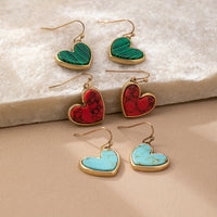 Gouden oorbellen met turquoise hart