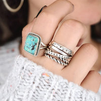 Zilveren brede draairing met turquoise accent