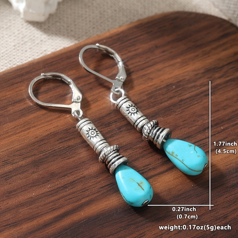 Zilveren etnische oorbellen met turquoise druppel