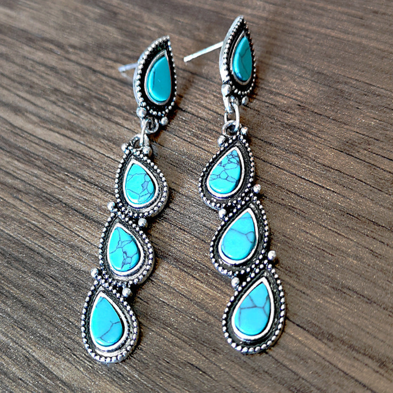 Zilveren vintage oorbellen met turquoise druppels