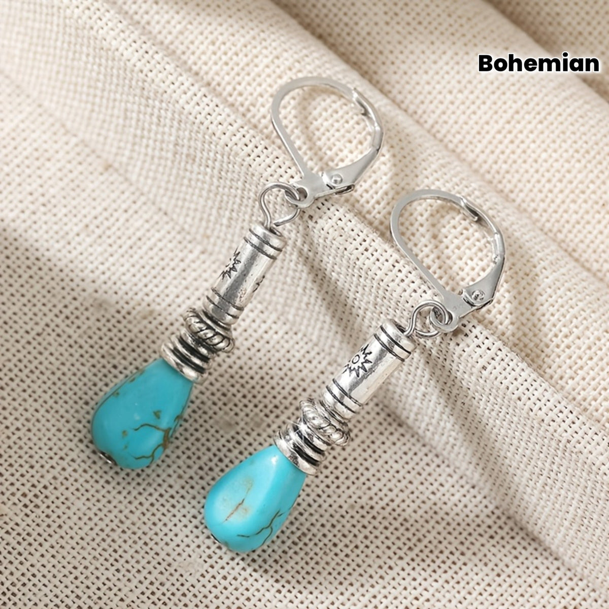 Zilveren vintage oorbellen met turquoise druppel