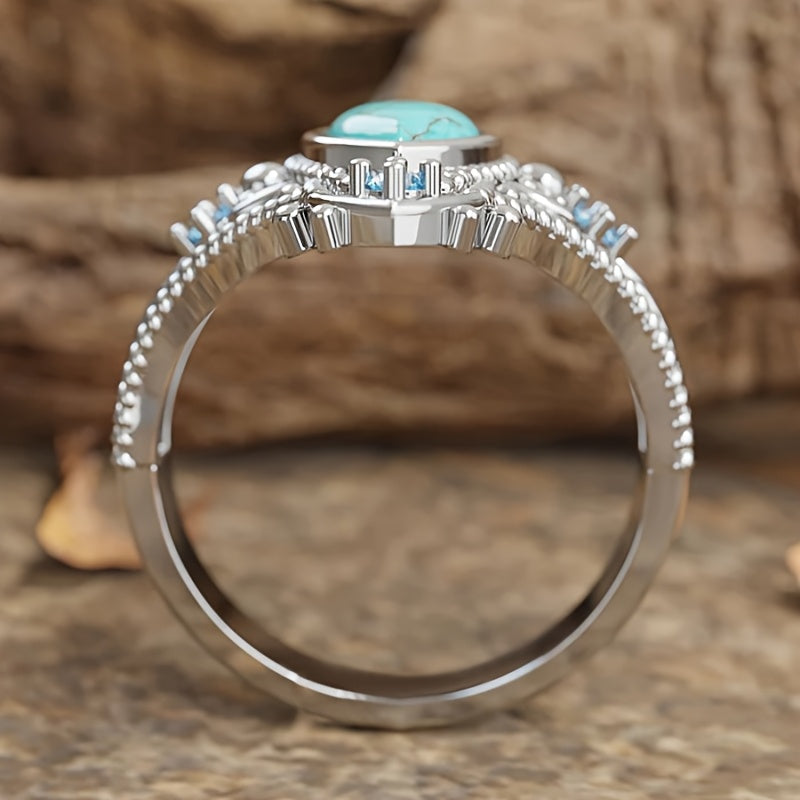 Zilveren vintage ring met marquise turkoois en blauwe steentjes