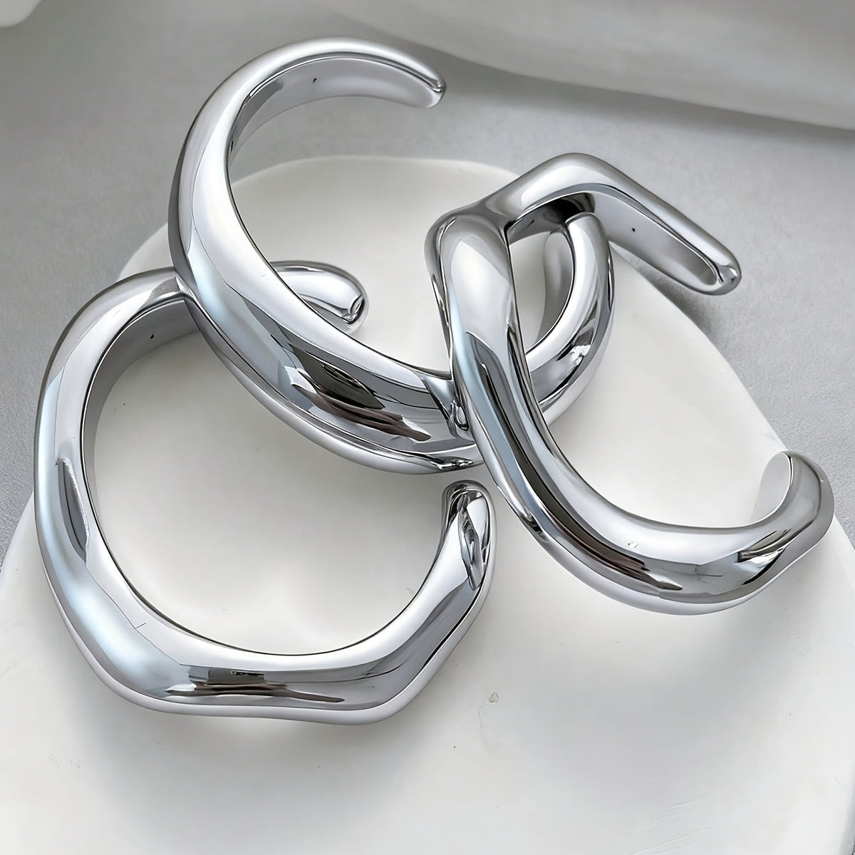 Zilveren chunky golvende bangle-armbandenset