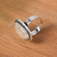 Zilveren ring met grote lichtblauwe ovale steen