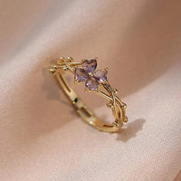 Gouden ring met paarse klavertjevier van zirkonia