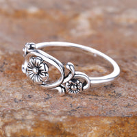 Zilveren vintage ring met bloemmotief
