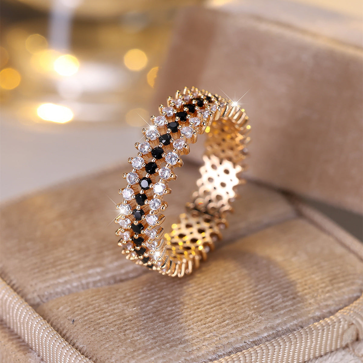 Roségouden eternity ring met zwarte en witte zirkonia