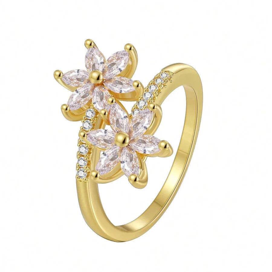Gouden ring met twee roze zirkonia bloemen