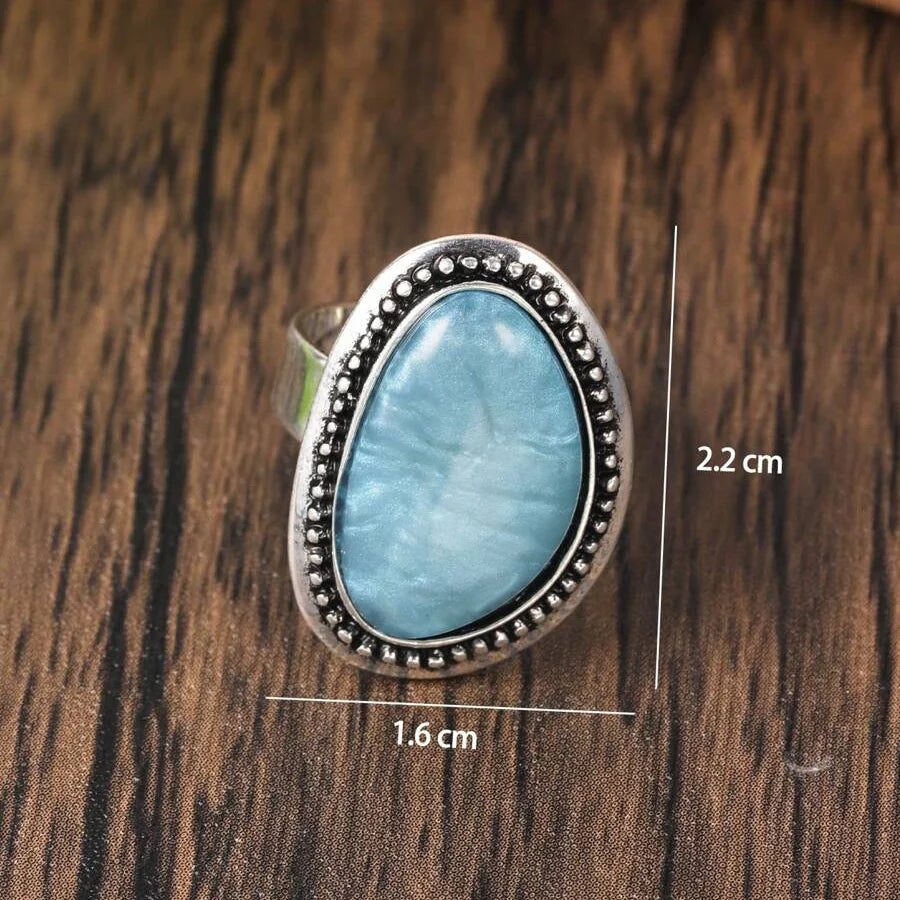 Zilveren ring met grote lichtblauwe ovale steen