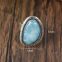 Zilveren ring met grote lichtblauwe ovale steen