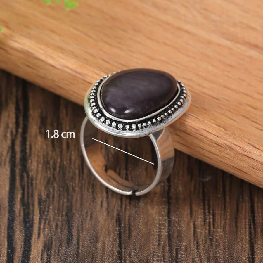 Zilveren ring met grote lichtblauwe ovale steen