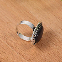 Zilveren ring met grote lichtblauwe ovale steen