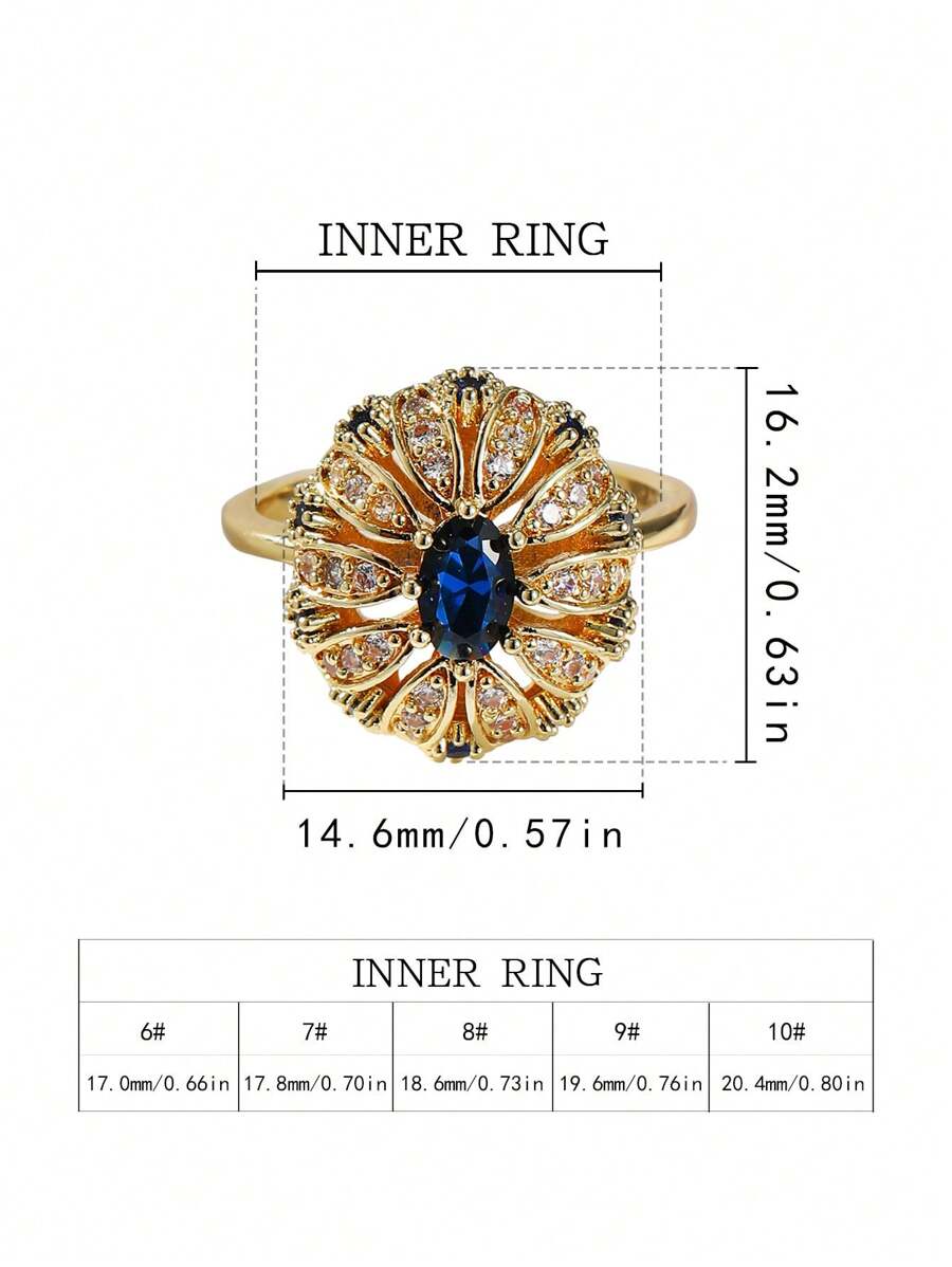 Gouden vintage ring met blauwe ovale steen en zirkonia