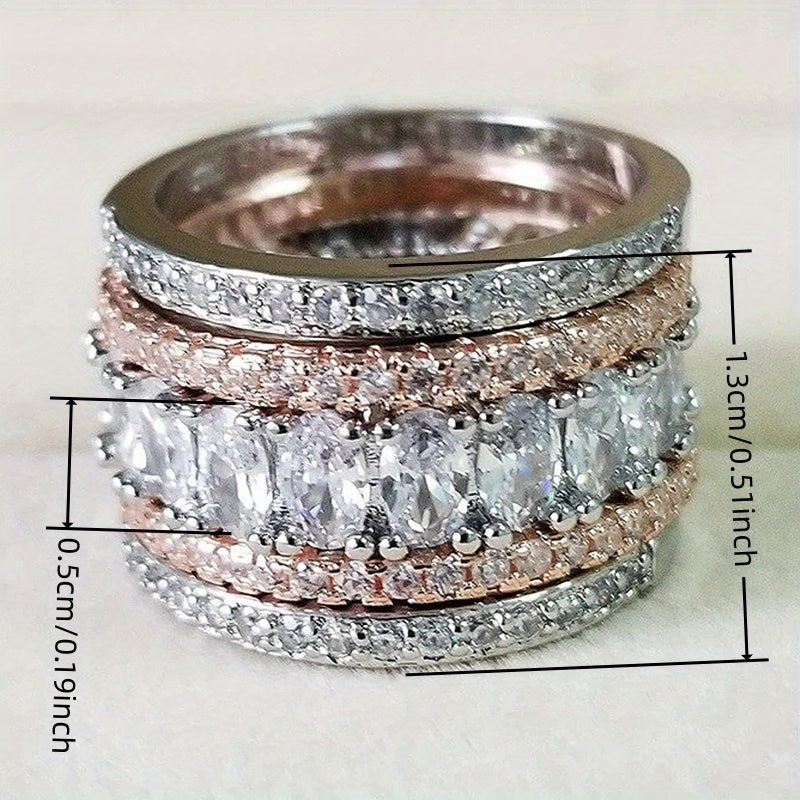 Brede tweekleurige eternityring met ovale zirkonia