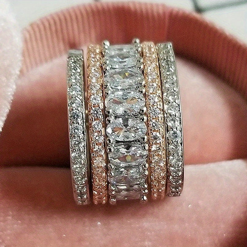 Brede tweekleurige eternityring met ovale zirkonia