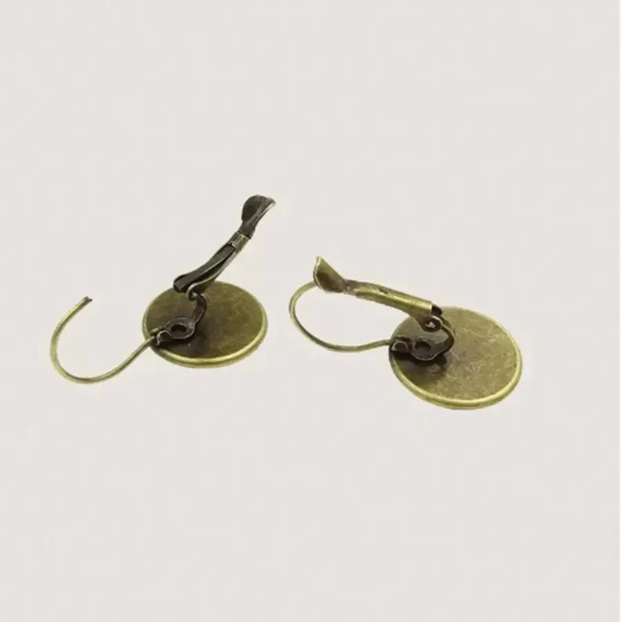 Vintage oorbellen met blauwe vogel in Delfts motief