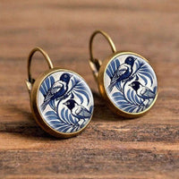 Vintage oorbellen met blauwe vogel in Delfts motief
