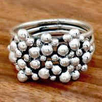 Zilveren bohemian ring met bolletjescluster