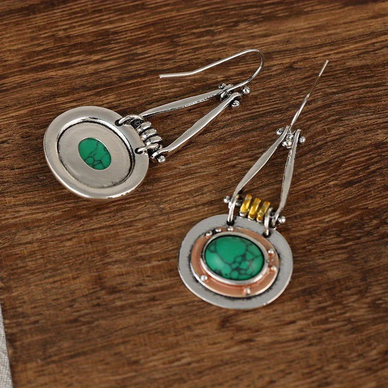 Zilveren oorbellen met groene turquoise in rosé rand