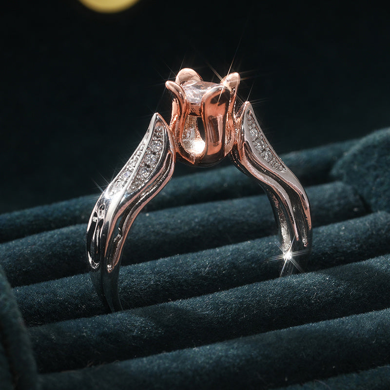 Tweekleurige zilveren en roségouden ring met zirkonia