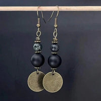 Bohemian bronzen oorbellen met ronde schijf en kralen
