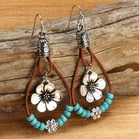 Zilveren bohemian oorbellen met turquoise druppels