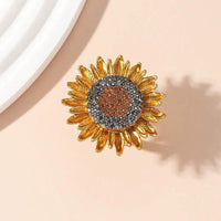 Gouden zonnebloemring met zirkonia