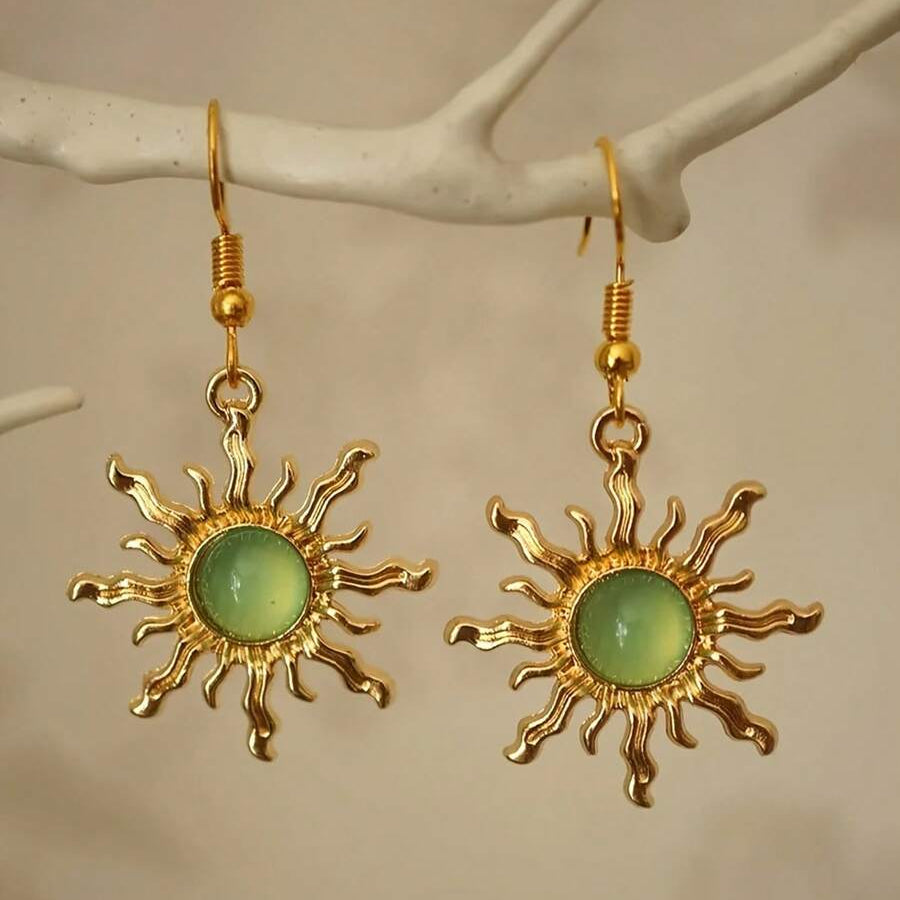 Gouden zonoorbellen met amber cabochon
