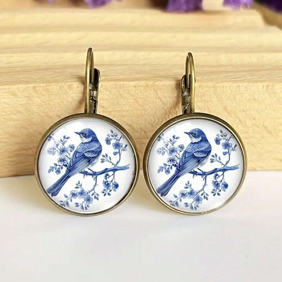 Vintage oorbellen met blauwe vogel in Delfts motief