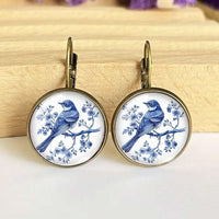 Vintage oorbellen met blauwe vogel in Delfts motief
