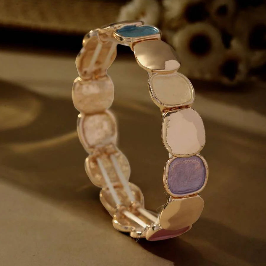 Gouden armband met onregelmatige glanzende schakels