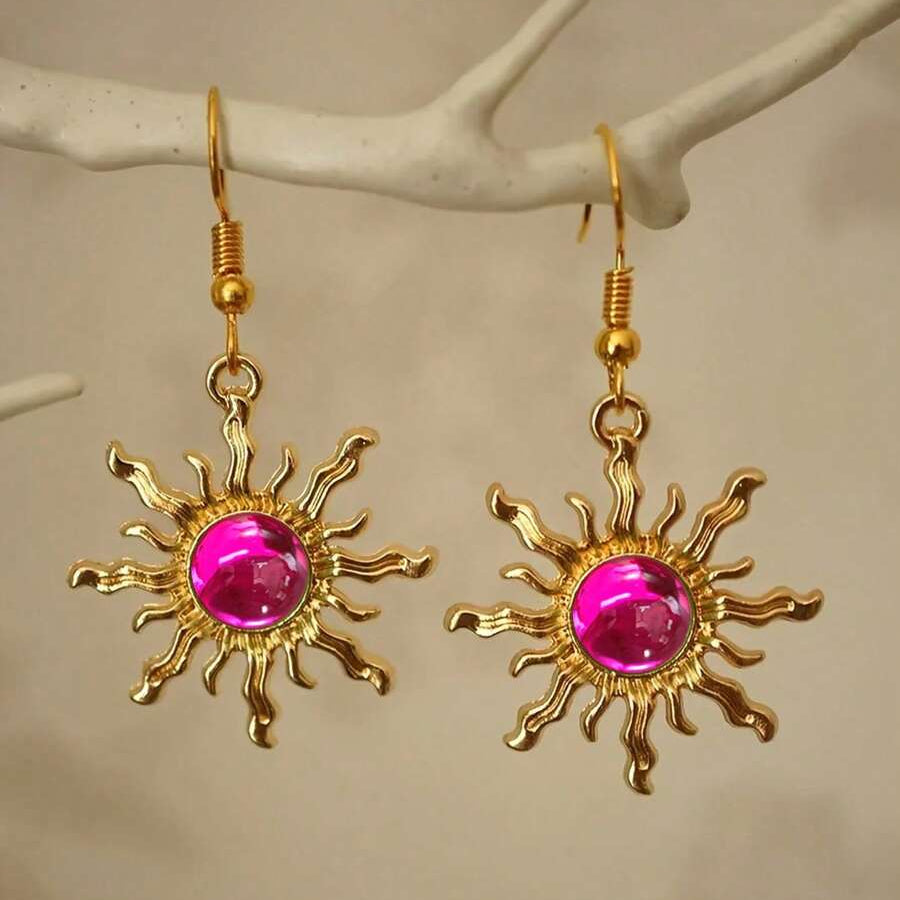 Gouden zonoorbellen met amber cabochon