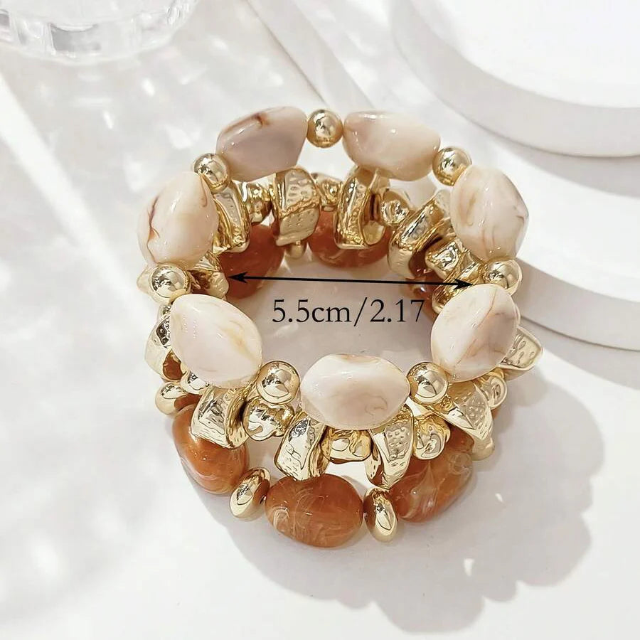 Gouden armband met onregelmatige natuursteen kralen