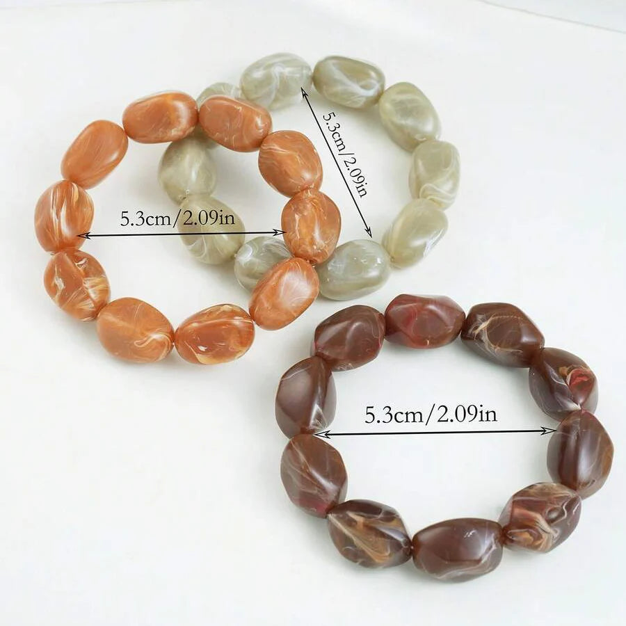 Gouden armband met onregelmatige natuursteen kralen