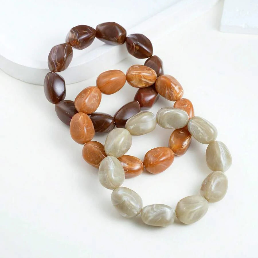 Gouden armband met onregelmatige natuursteen kralen