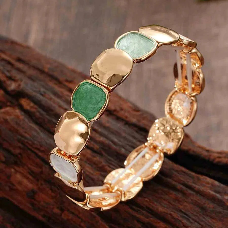 Gouden armband met onregelmatige glanzende schakels