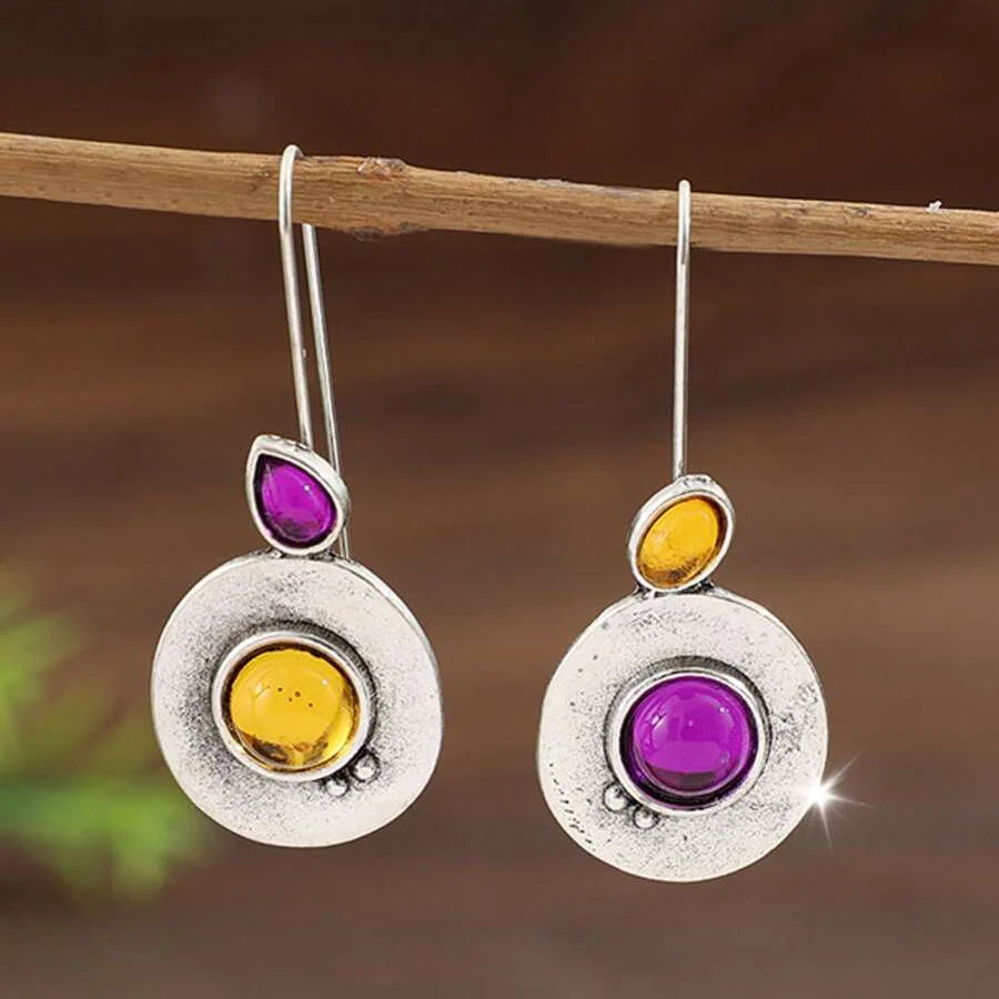 Vintage oorbellen met witte parel en stralenkrans