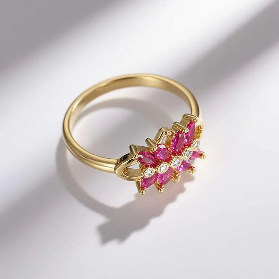 Gouden ring met twee roze zirkonia bloemen