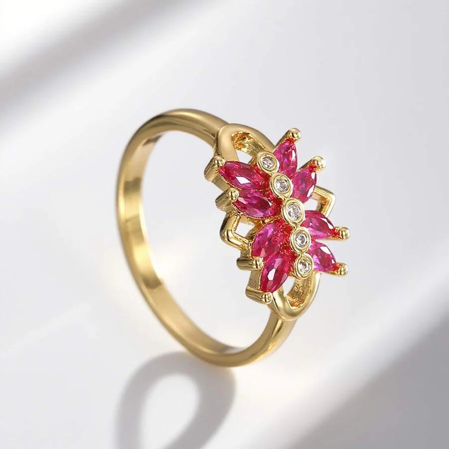Gouden ring met twee roze zirkonia bloemen