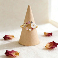 Roségouden ring met bloemkrans, parel en gekleurde zirkonia